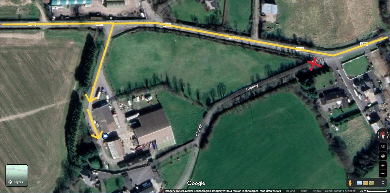 Satellite route diagram: the red X is the wrong farmhouse lane; follow the yellow route along the R427, turn left into the next lane, and continue to the blue workshop marker