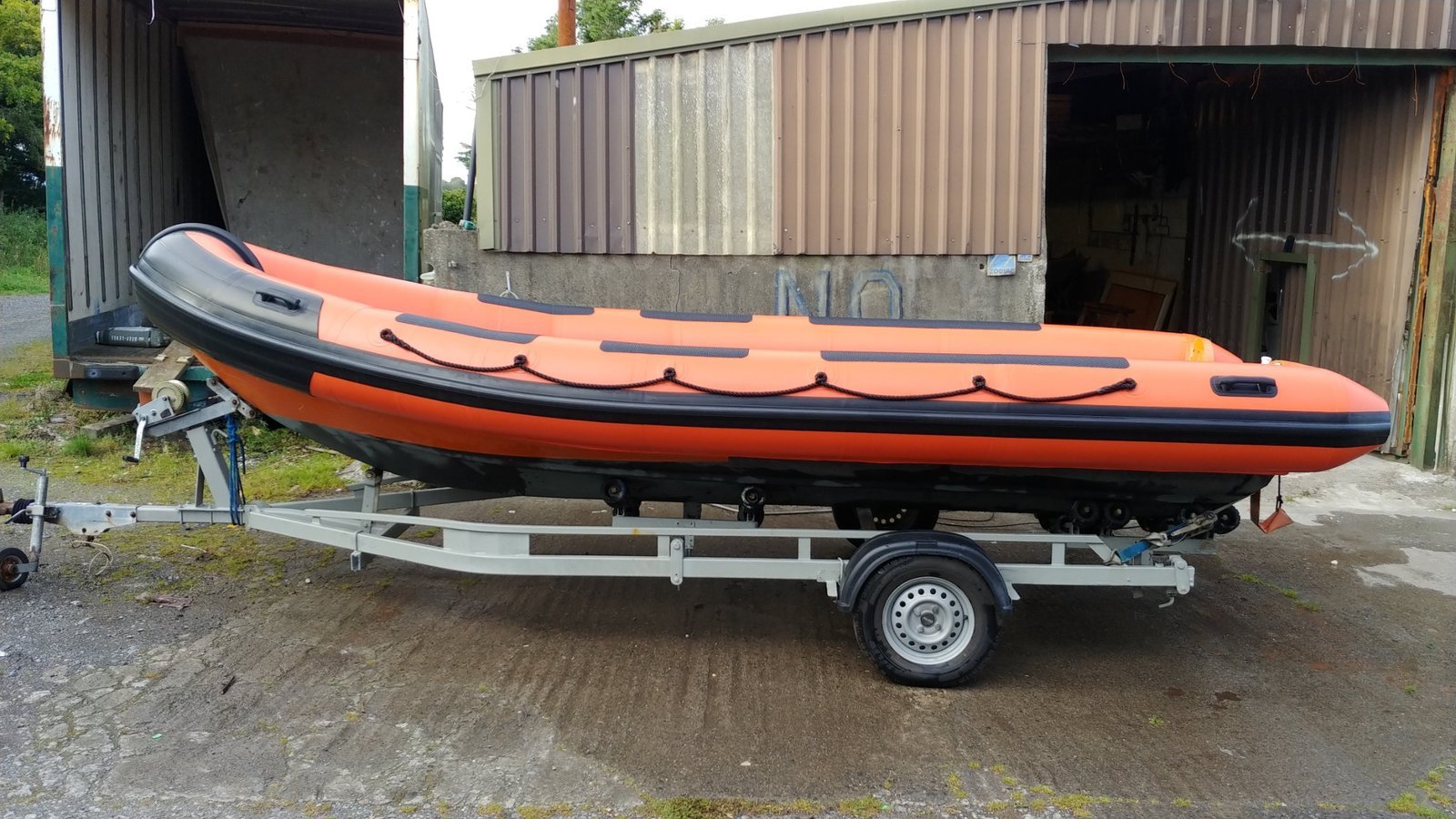 Orange RIB tube set on a trailer